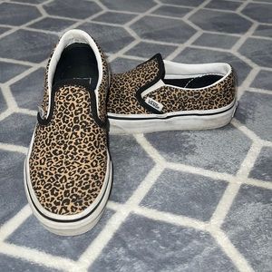 Kids cheetah slip on Vans